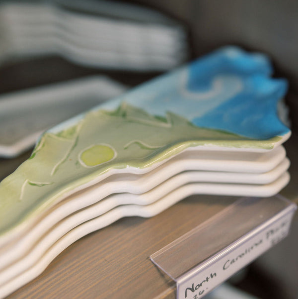 Pottery shelves at CREATIVE paint-your-own pottery studio