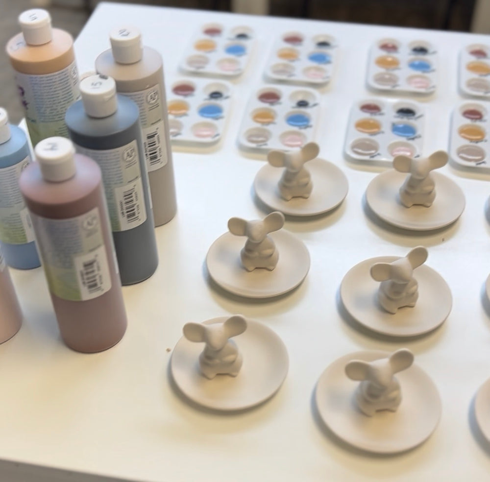 Pottery set up and ready to paint at a CREATIVE offsite event